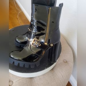 Black and gold boots.